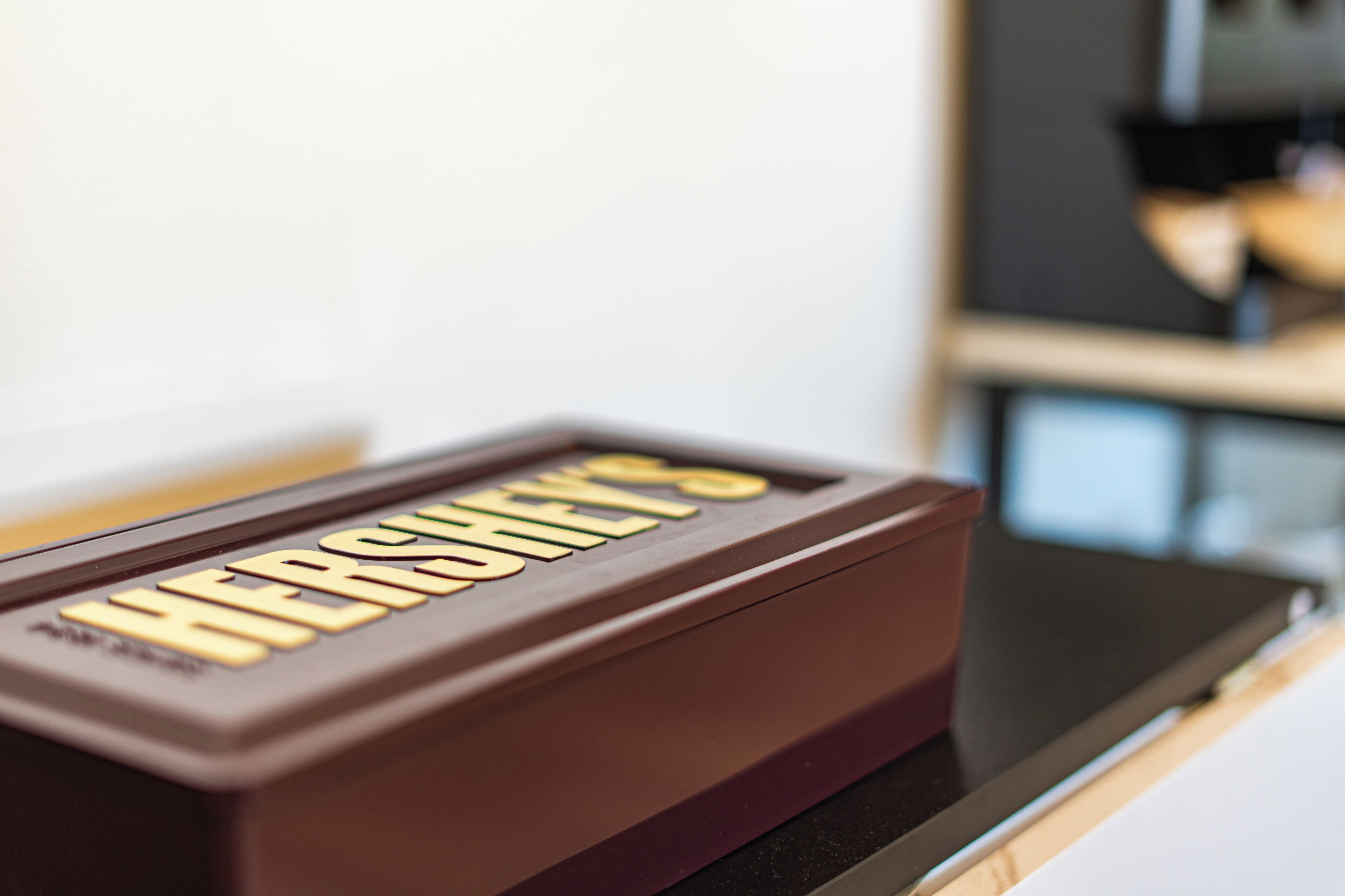 A chocolate bar with the word "HERSHEY'S" on it.