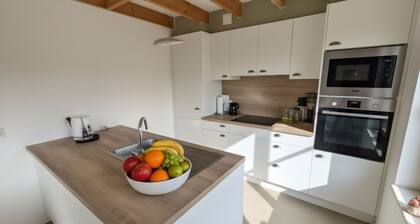 Cozy holiday home in park near the sea