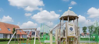 Holiday home with fenced garden near coast