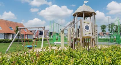 Holiday home with fenced garden near coast