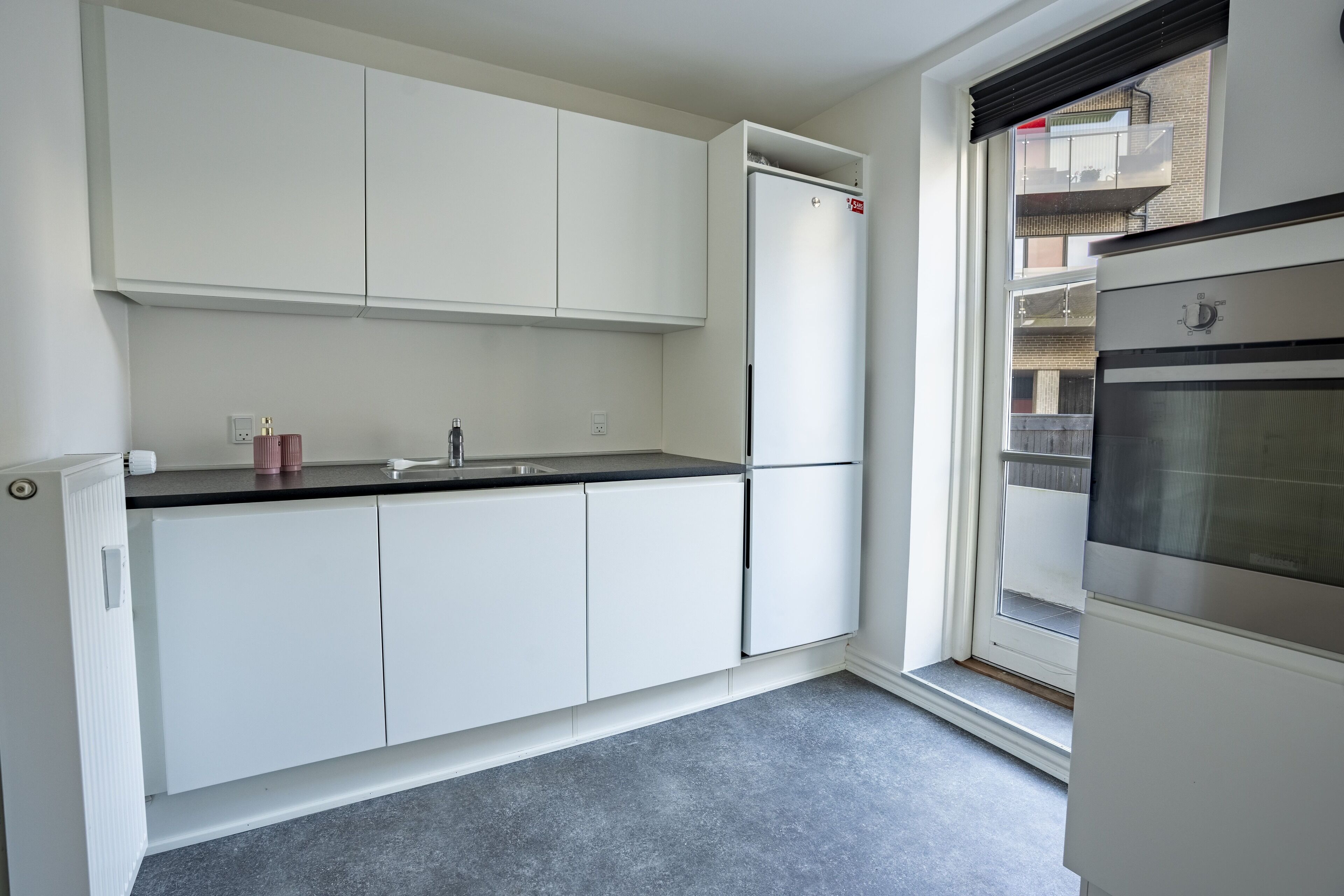 Family Apartment, Courtyard View | Private kitchen | Fridge, microwave, oven, stovetop