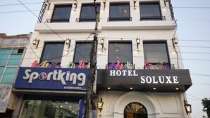 A hotel named 'Hotel Soluxe' with a sign for 'Sportking' on the ground floor. - HOTEL SOLUXE (Jagadhri)