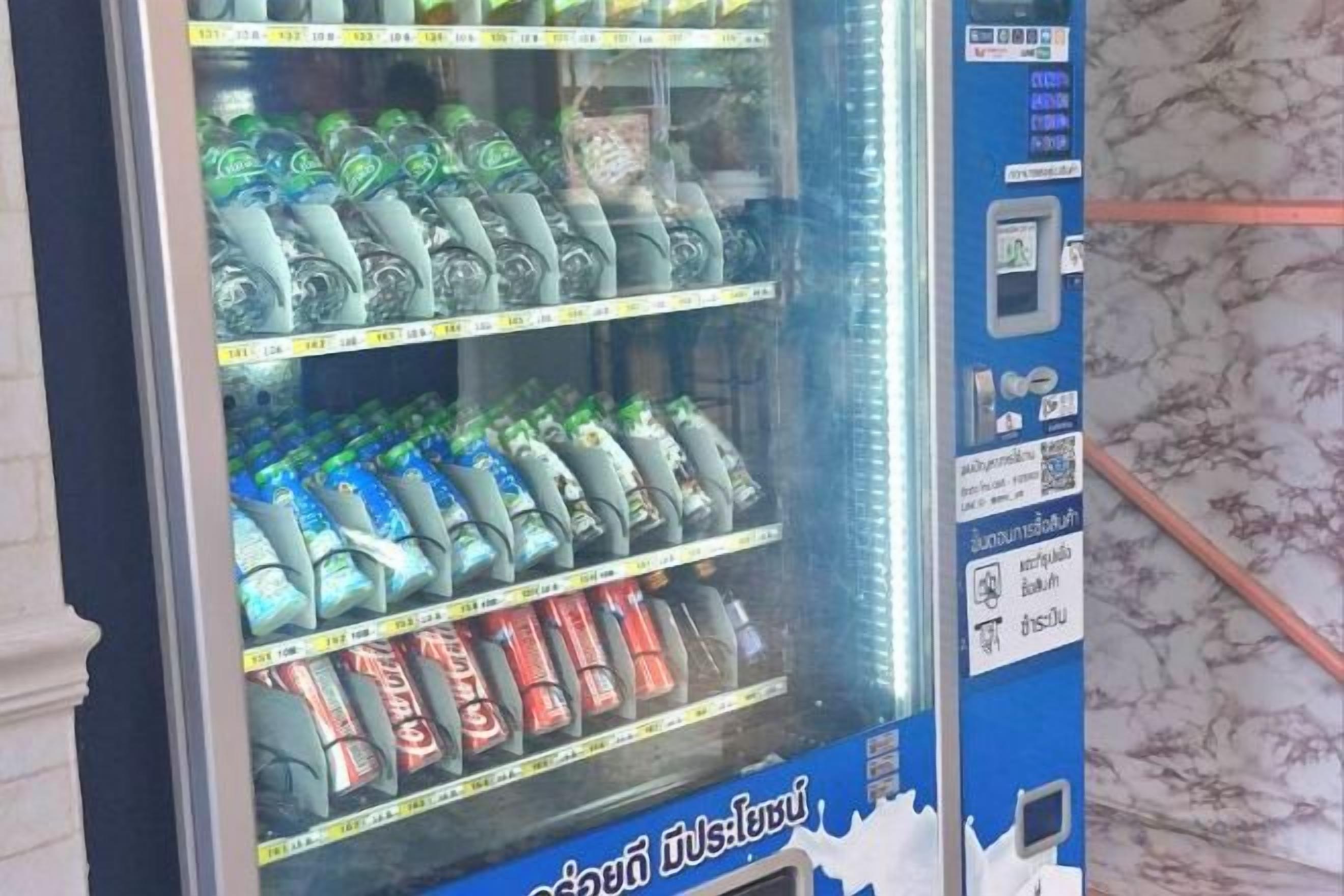 A vending machine with multiple beverage options.