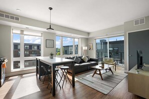 Apartment | Living area | 42-inch Smart TV with digital channels, streaming services