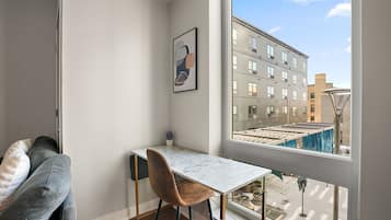 Studio | Living area | 42-inch Smart TV with digital channels, streaming services