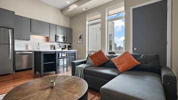 Studio | Living area | 42-inch Smart TV with digital channels, streaming services