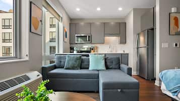 Studio | Living area | 42-inch Smart TV with digital channels, streaming services