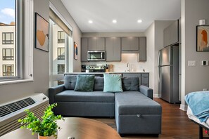 Studio | Living area | 42-inch Smart TV with digital channels, streaming services