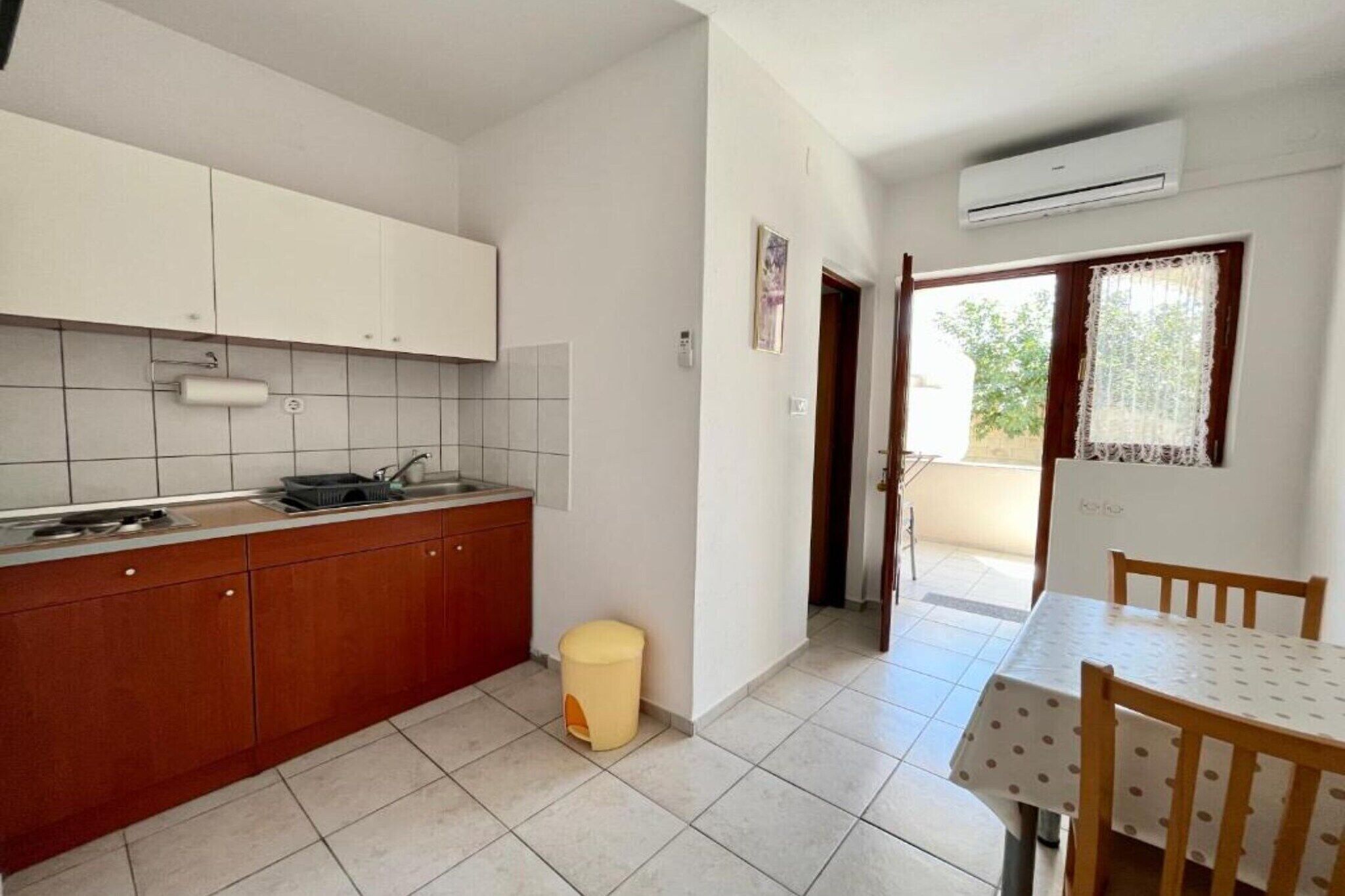 Fridge, stovetop, dining tables