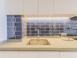 Deluxe Studio, Balcony, City View | Private kitchen | Espresso maker, electric kettle