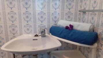 Regadera y secadora de cabello