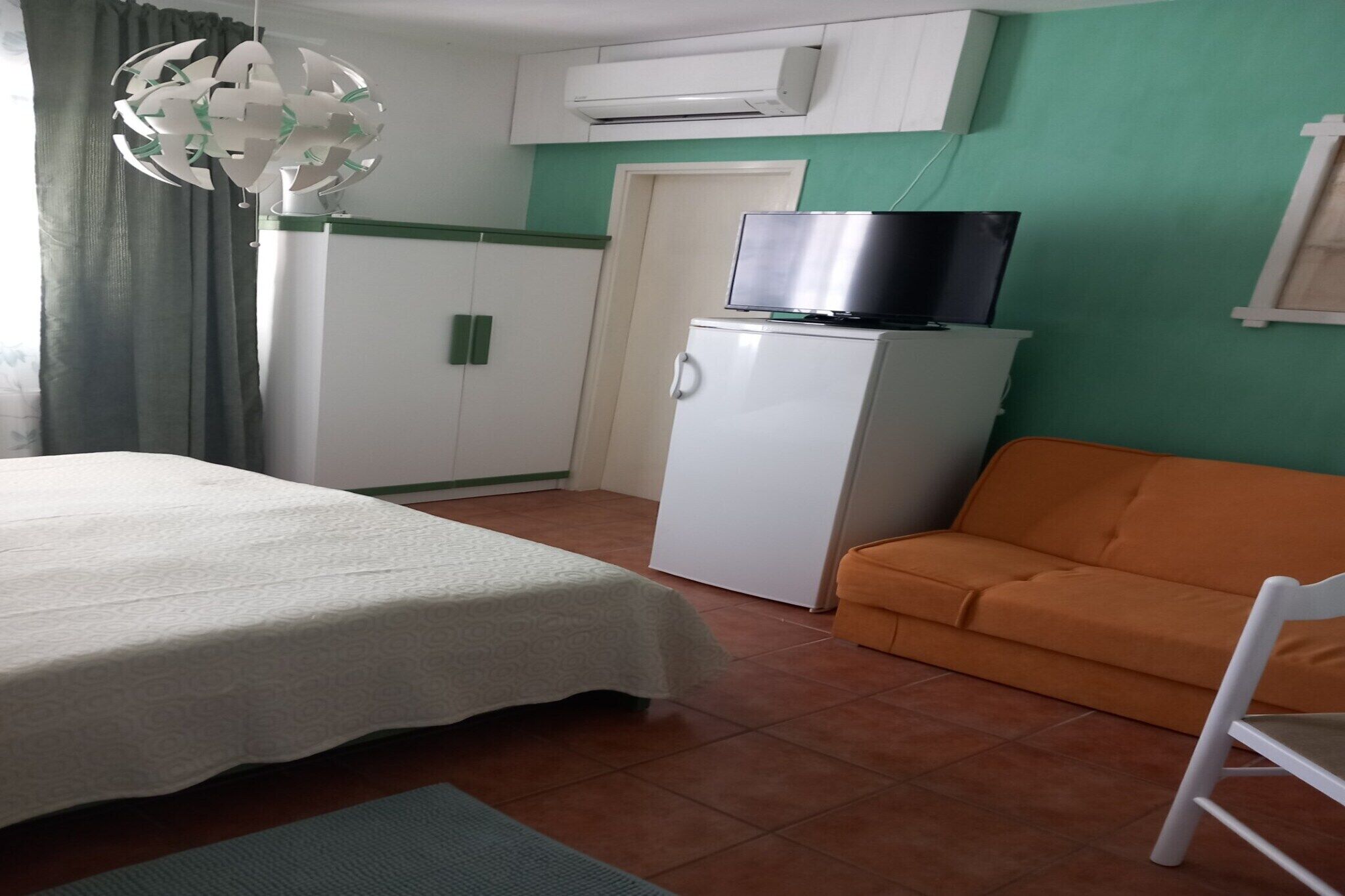 Fer et planche à repasser, lit parapluie, Wi-Fi gratuit