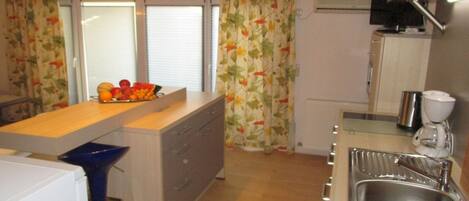 Refrigerador, placa de cocina