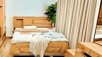 2 dormitorios, tabla de planchar con plancha, Internet y ropa de cama