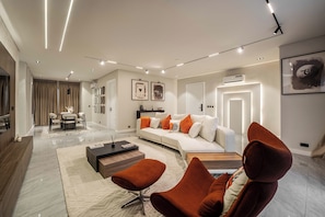 Apartamento superior | Zona de estar