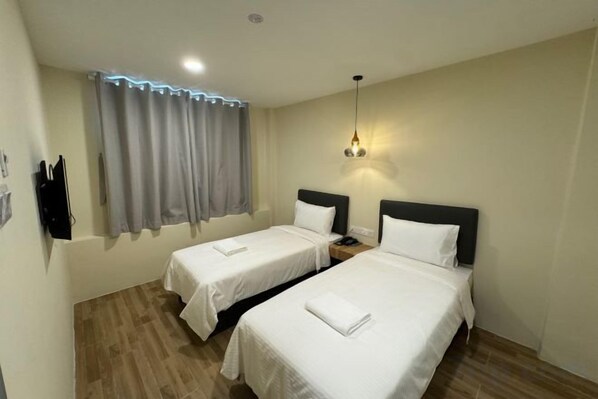 Unclassified image, 1 of 12, button - Check Inn 5 (Kota Kinabalu)
