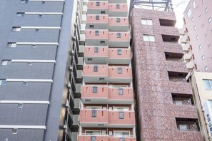 A multi-story building with balconies and windows. - Sharumu Biruzu Matsuyamachi (Osaka)