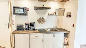 Een magnetron, een oven