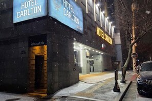 A hotel named 'Hotel Carlton' with a visible entrance and signage. - Carlton Hotel (Incheon)