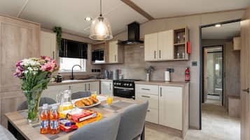 Fridge, microwave, toaster, cookware/dishes/utensils