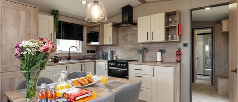 Fridge, microwave, cookware/dishes/utensils