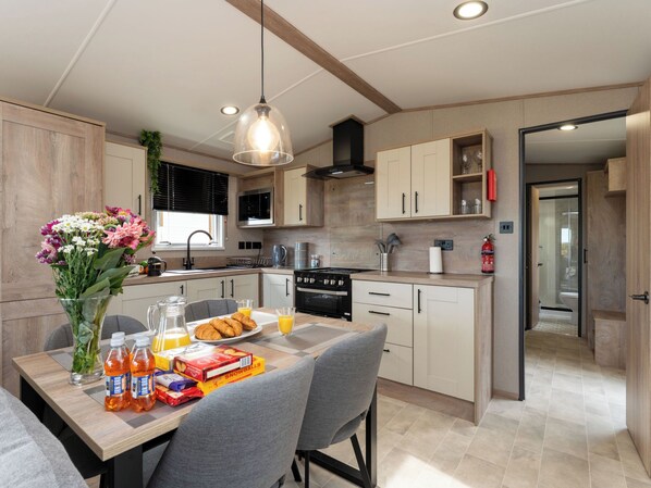 Fridge, microwave, cookware/dishes/utensils