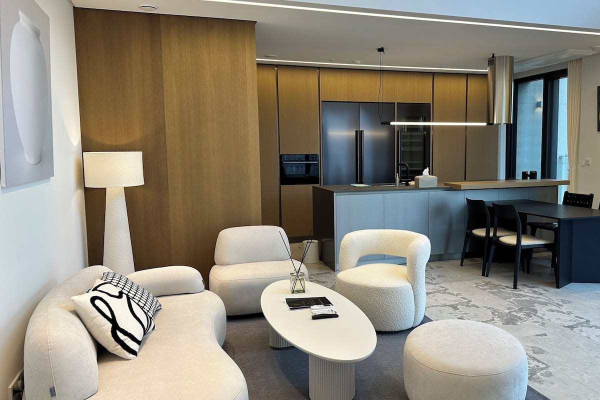 Luxury Apartment, 3 Bedrooms, City View | Living area | 85-inch Smart TV with digital channels, Netflix, heated floors