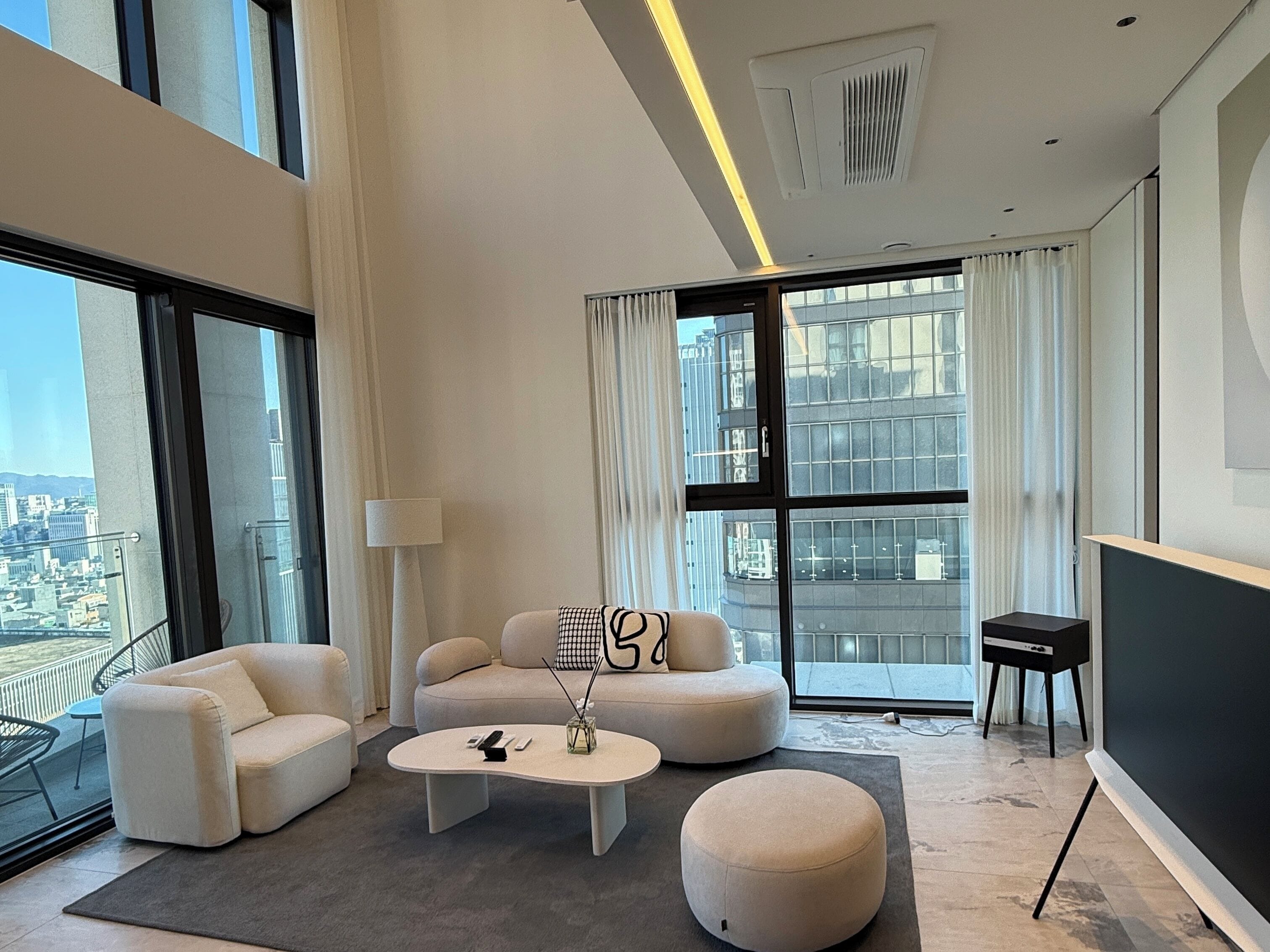 Luxury Apartment, 2 Bedrooms, Balcony, City View (FREE Airport Pick up and sending for 7Nights) | Living area | 85-inch Smart TV with digital channels, Netflix, streaming services