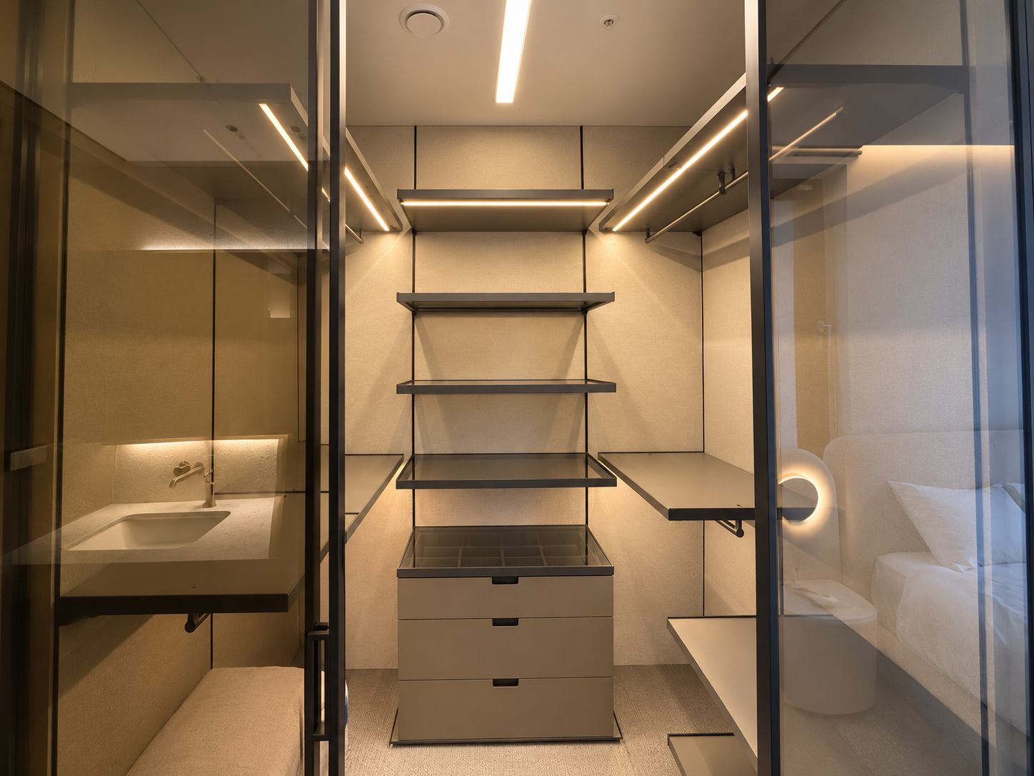 A modern bathroom with a glass shower enclosure, a built-in toilet, and a vanity with a sink.
