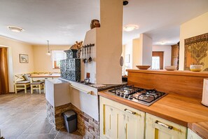 Fridge, stovetop, dining tables