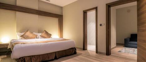 Suite, 2 Bedrooms | Blackout drapes, soundproofing, iron/ironing board, free WiFi