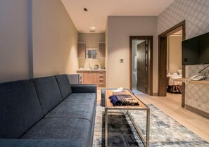 Suite, 2 habitaciones | Área de sala de estar