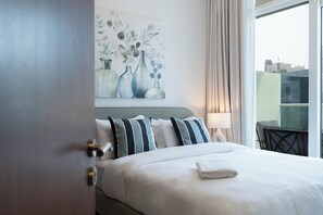 1 chambre, coffre-fort, bureau, fer et planche à repasser