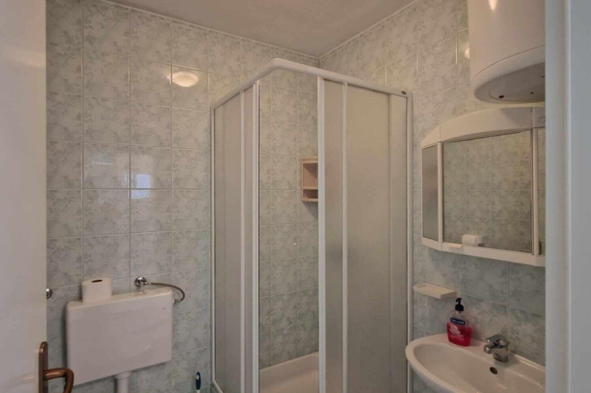 Shower, hair dryer