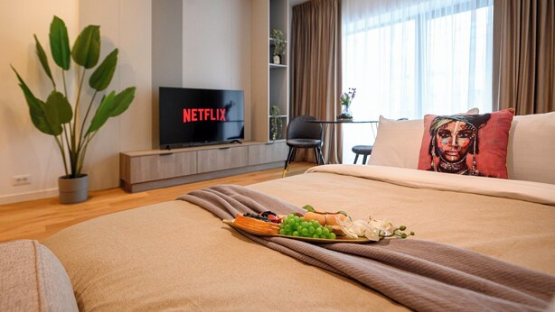 Superior Apartment, 1 Queen Bed with Sofa bed, Courtyard View | Living area | 127-cm Smart TV with digital channels, Netflix, streaming services