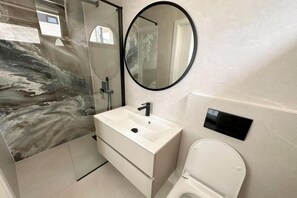 Douche, sèche-cheveux