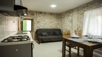 Fridge, stovetop, dining tables