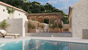 A pool area with a pergola, lounge chairs, and a stone wall. - Villa Marina - Five Bedroom Villa With Pool (Metkovic)