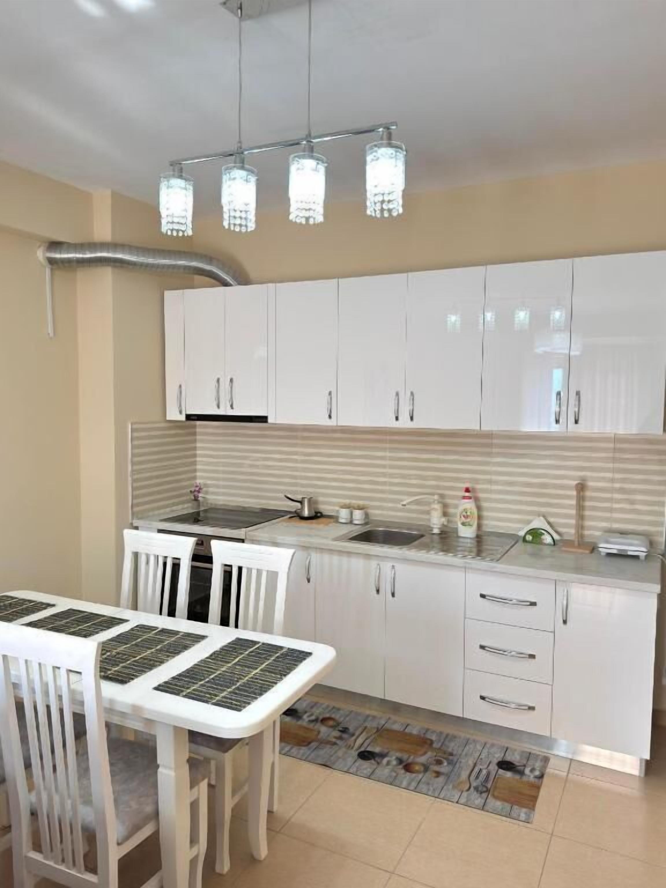 Apartment, Balcony, City View | Private kitchen | Electric kettle, toaster