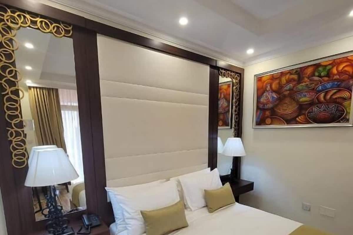 Standard Double Room, Balcony, Garden View | In-room safe, soundproofing, free WiFi