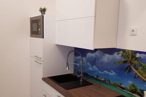 Réfrigérateur, four, plaque de cuisson, lave-vaisselle