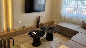 Deluxe Apartment, Balcony, City View | Living room