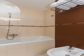 Regadera y secadora de cabello 