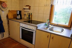 Fridge, stovetop, coffee/tea maker, toaster