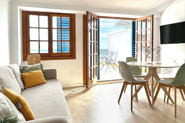 Apartment, Sea View | Living area | TV