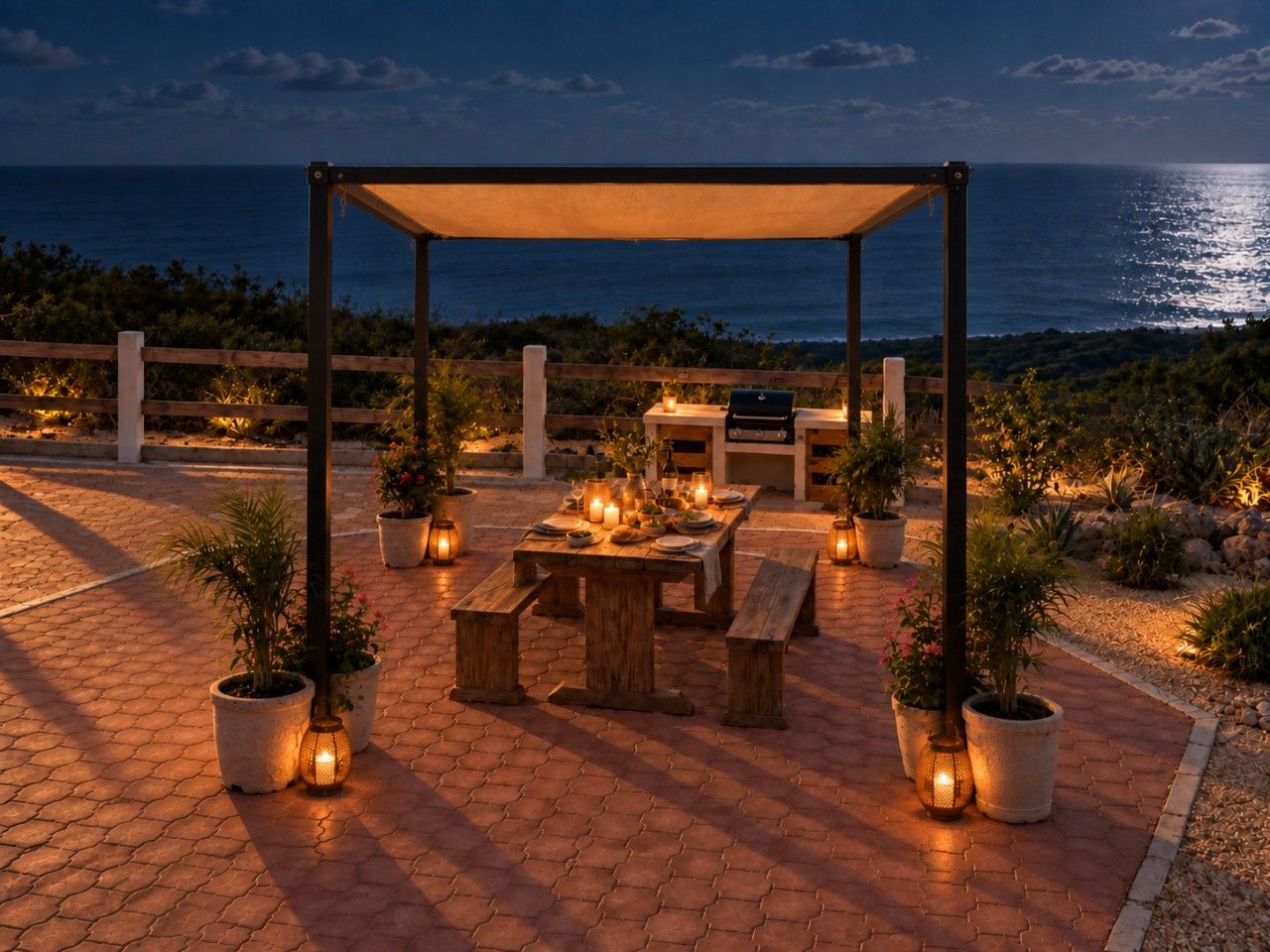 An outdoor dining area with a wooden table and benches, surrounded by potted plants and candles.