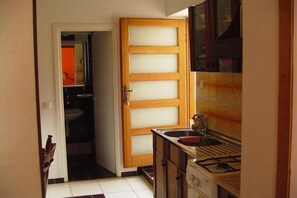 Fridge, oven, stovetop, dining tables