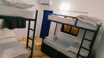 Economy Shared Dormitory | Laptop workspace, bed sheets