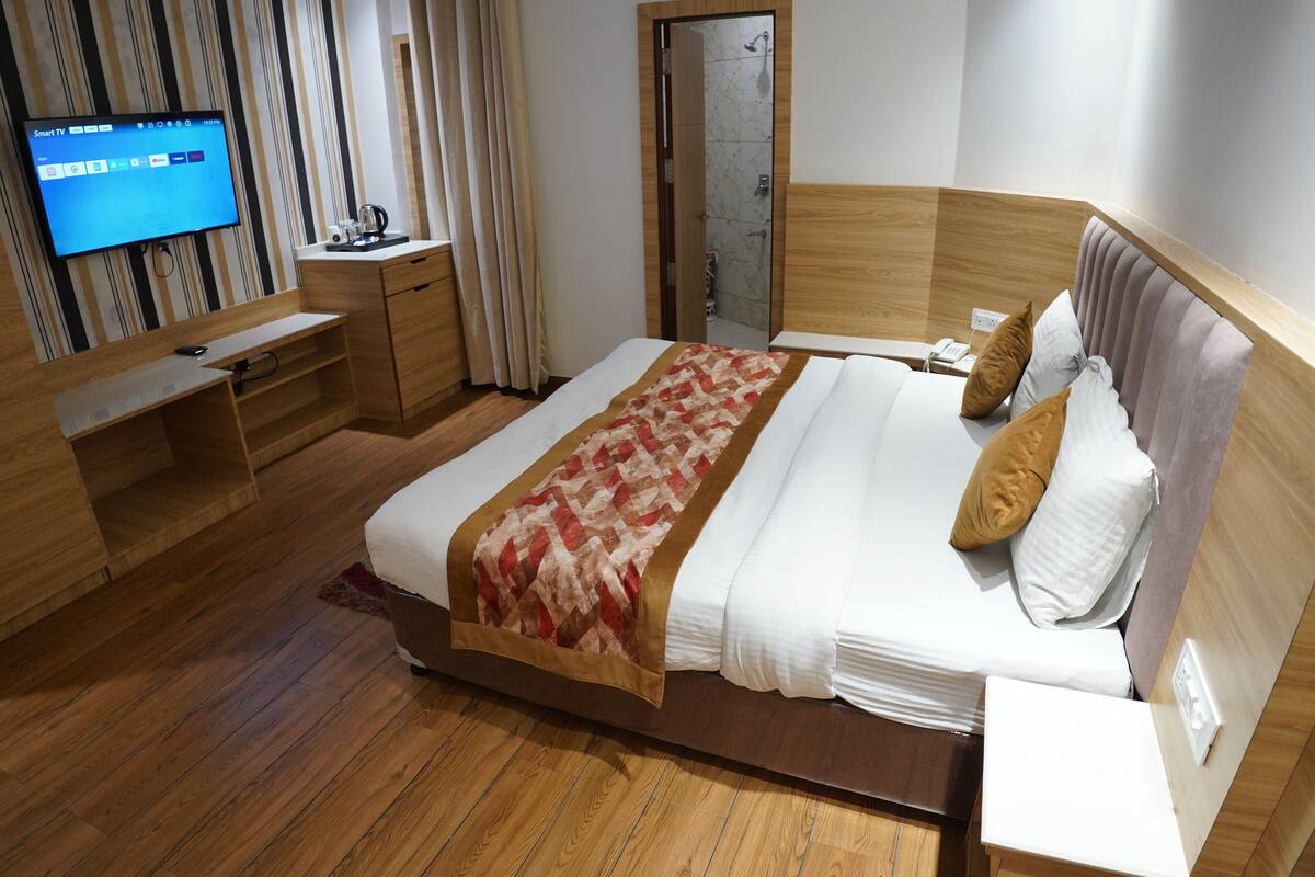 Camera Executive con letto matrimoniale o 2 letti singoli | Una scrivania, postazione laptop, Wi-Fi gratuito