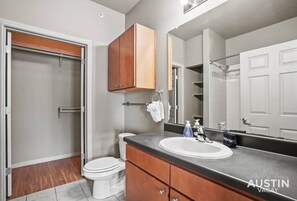 Hair dryer, towels, shampoo, toilet paper